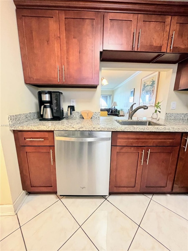 kitchen featuring light tile patterned floors, stainless steel dishwasher, and sink