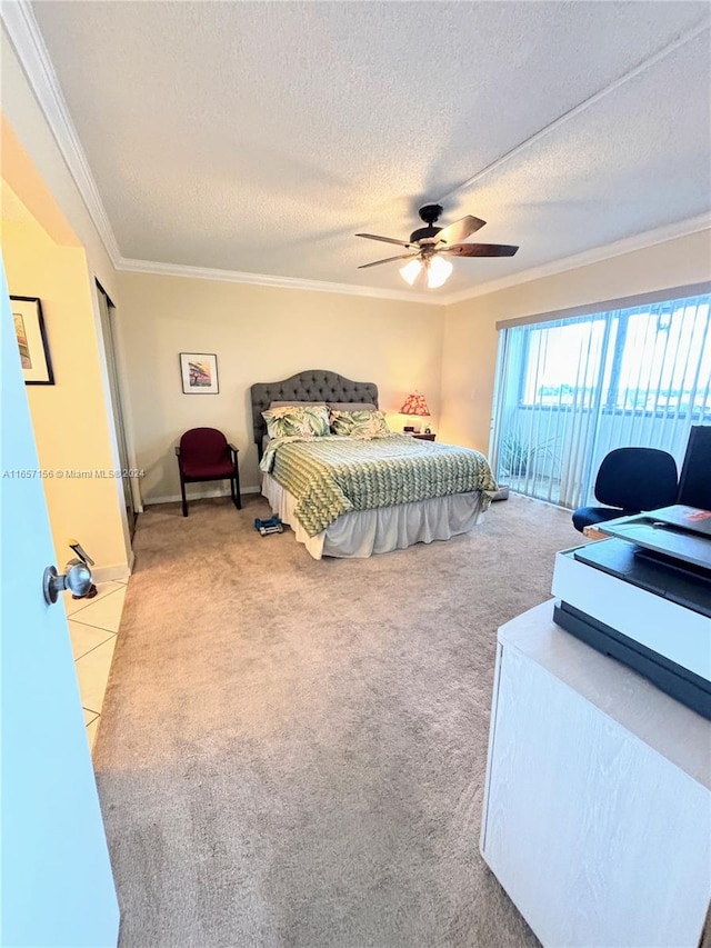 bedroom featuring a textured ceiling, light carpet, access to exterior, crown molding, and ceiling fan