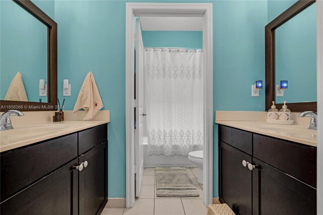 full bathroom featuring vanity, toilet, shower / tub combo, and tile patterned flooring