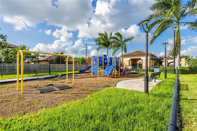 view of play area with a yard