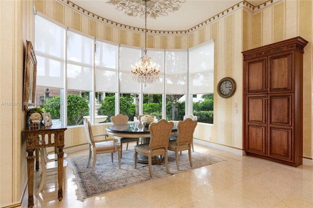 dining area with a notable chandelier and light tile patterned floors