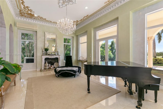 living area featuring a fireplace, crown molding, and a notable chandelier