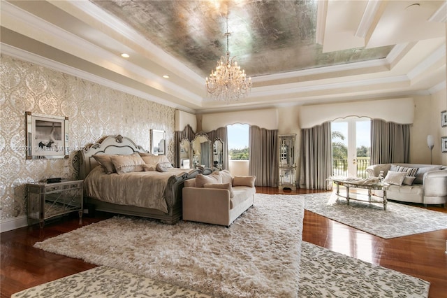 bedroom featuring crown molding, french doors, an inviting chandelier, a tray ceiling, and dark wood-type flooring