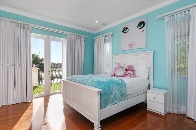 bedroom with dark wood-type flooring, ornamental molding, access to outside, and french doors