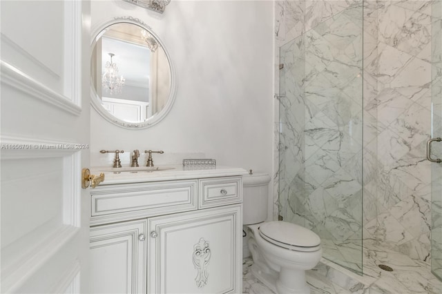 bathroom featuring vanity, toilet, and an enclosed shower