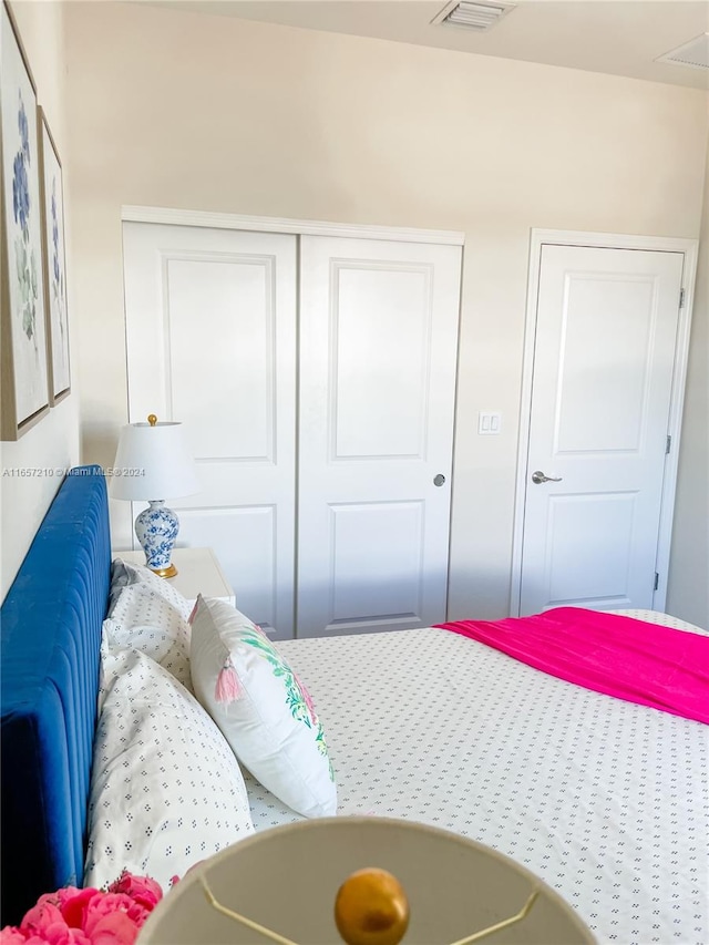 bedroom featuring a closet and carpet flooring