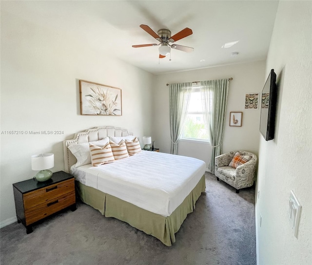 bedroom featuring ceiling fan and carpet floors