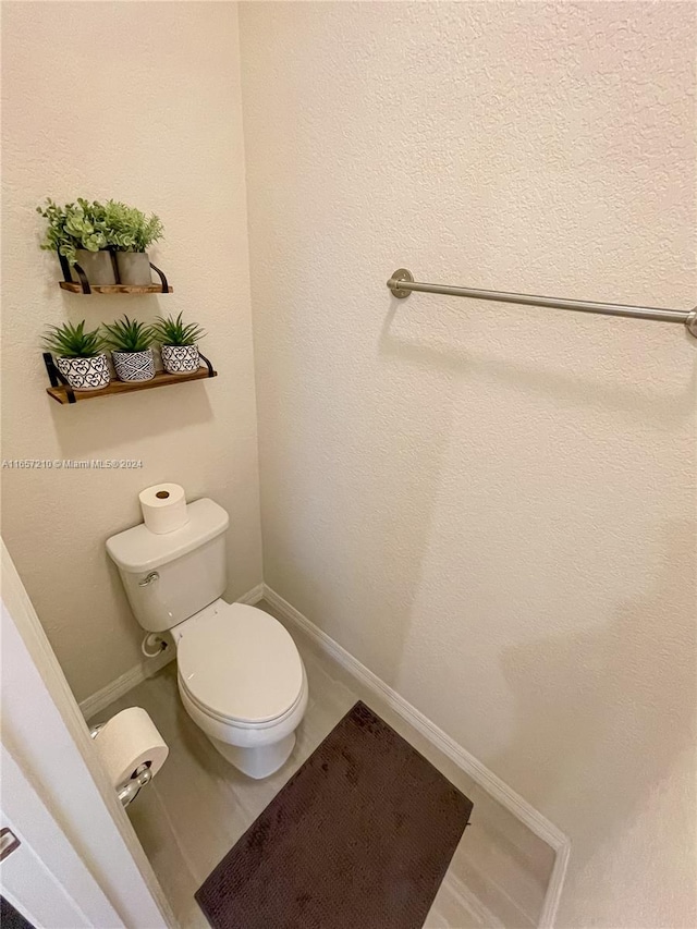 bathroom featuring toilet