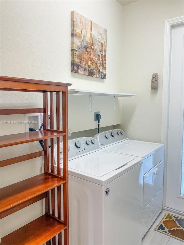 laundry area featuring independent washer and dryer