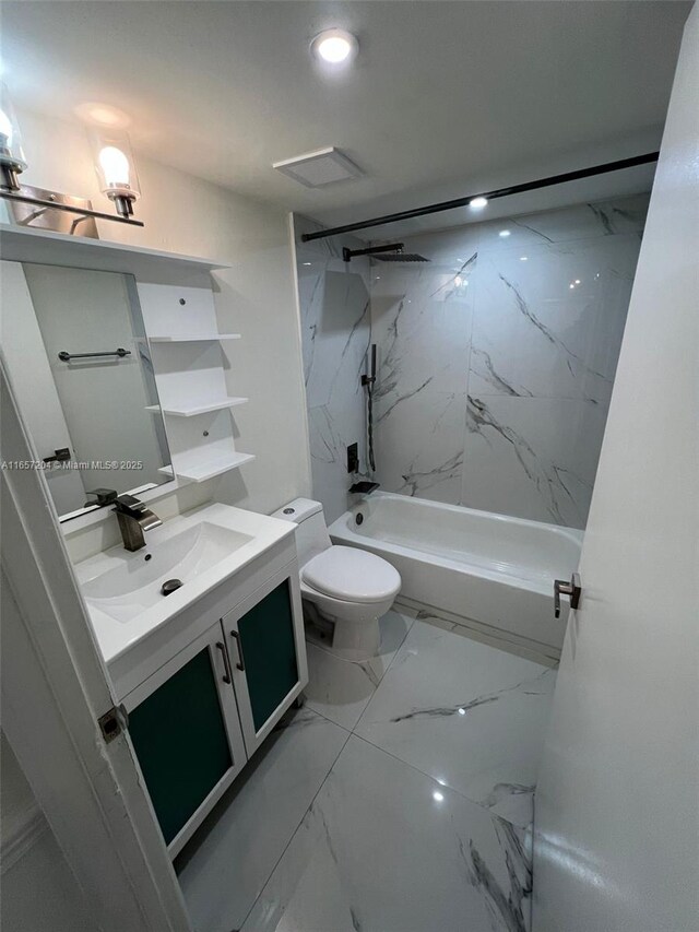 bathroom with vanity, toilet, and hardwood / wood-style floors