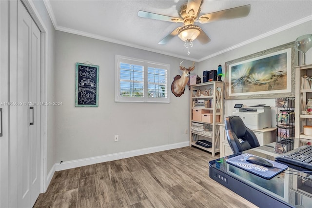 home office featuring crown molding, a textured ceiling, hardwood / wood-style floors, and ceiling fan