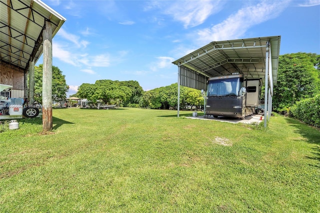 view of yard with a carport