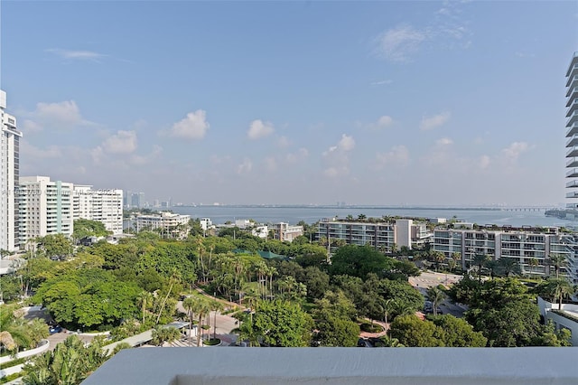 exterior space with a water view and a view of city