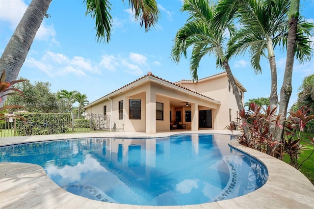 view of swimming pool with a patio area