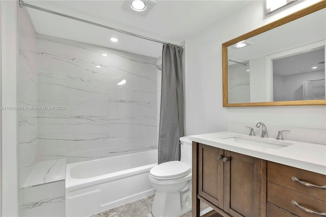 full bathroom with vanity, toilet, and shower / bath combo