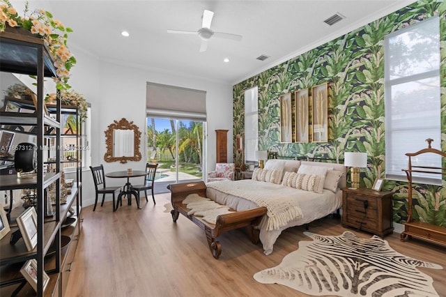 bedroom featuring crown molding, wood-type flooring, access to exterior, and ceiling fan