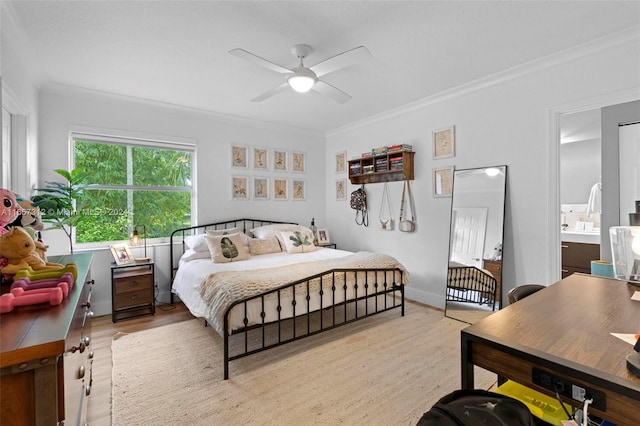 bedroom with ornamental molding, light hardwood / wood-style flooring, ensuite bath, and ceiling fan