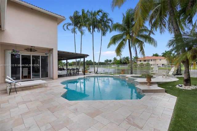 view of pool featuring a patio area and ceiling fan