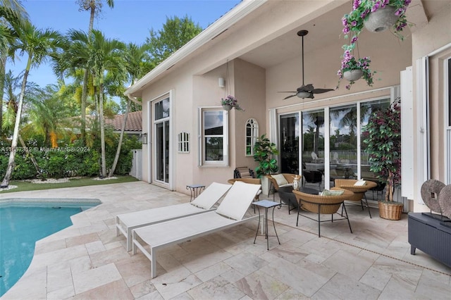 view of patio with ceiling fan and an outdoor hangout area