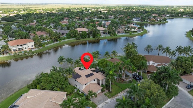 bird's eye view with a water view