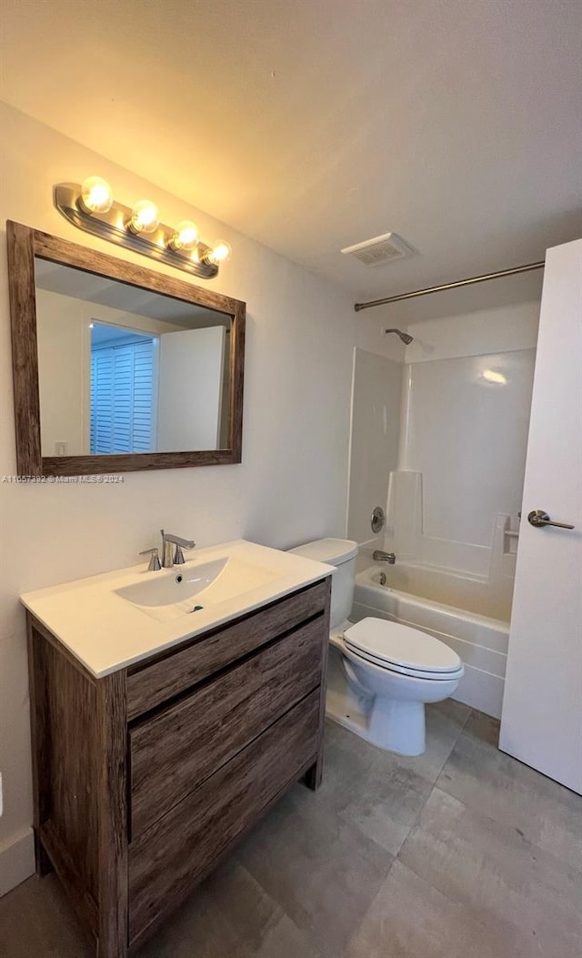 full bathroom featuring vanity, toilet, and  shower combination