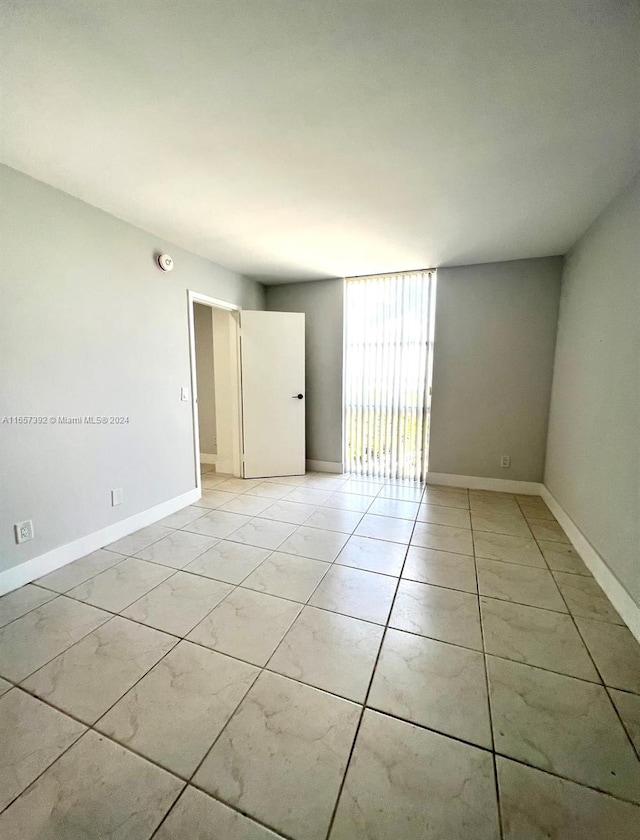 view of tiled empty room