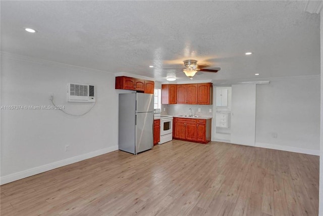 kitchen featuring stainless steel fridge, light hardwood / wood-style floors, sink, white electric range oven, and ceiling fan