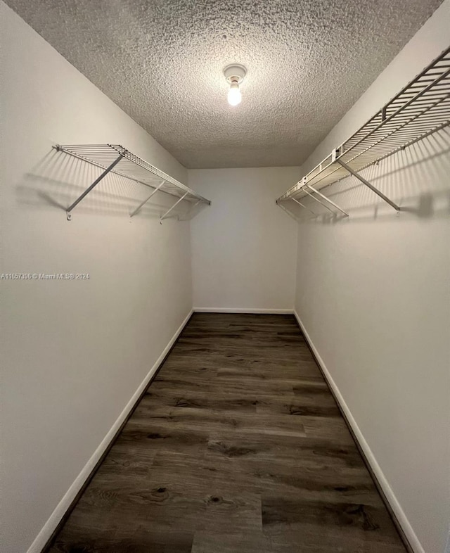 13499 Biscayne Blvd Unit 1205, North Miami, FL 33181 - spacious closet featuring wood finished floors