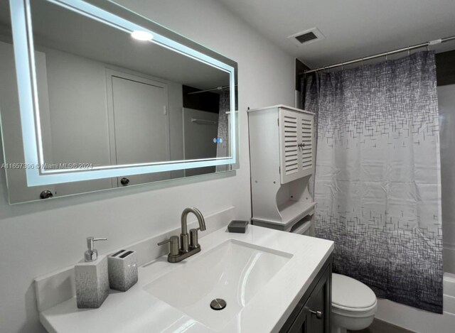 13499 Biscayne Blvd Unit 1205, North Miami, FL 33181 - bathroom featuring toilet and vanity