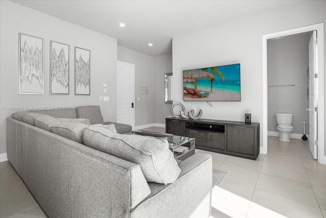 living room with light tile patterned floors