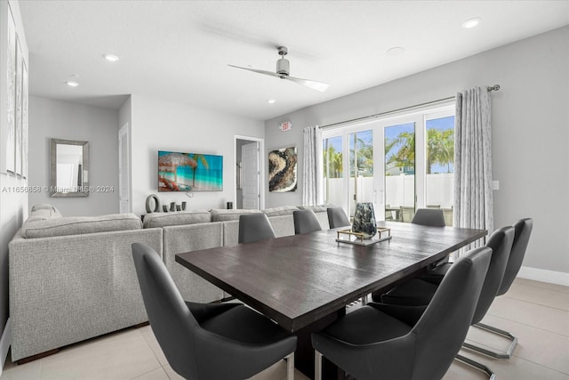 dining area with ceiling fan and light tile patterned floors