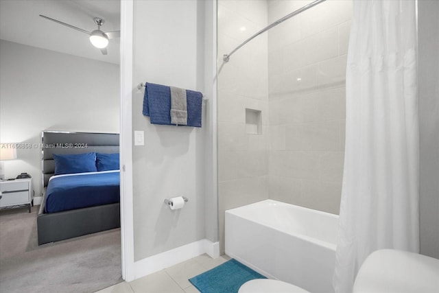 bathroom with tile patterned floors, shower / tub combo, and toilet