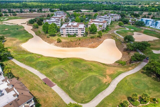 7740 Sandy Ridge Dr Unit 112, Kissimmee, FL 34747 - aerial overview of property's location featuring a local golf course and apartment complex / building