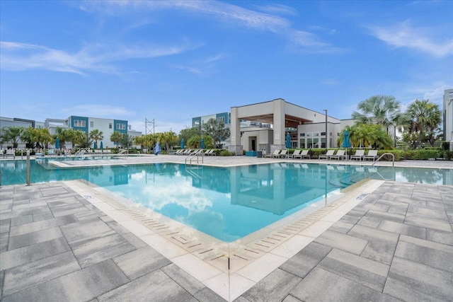 view of swimming pool featuring a patio