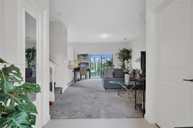 living room with light carpet