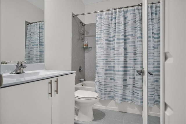 full bathroom featuring vanity, toilet, shower / tub combo, and tile patterned floors