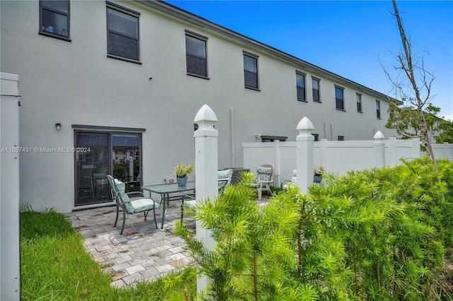 rear view of property with a patio area