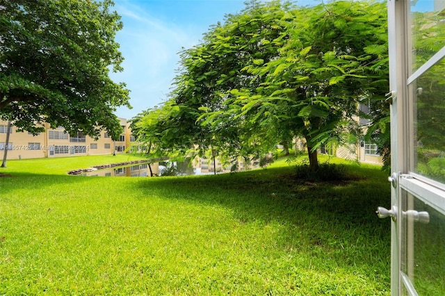 view of yard with a water view