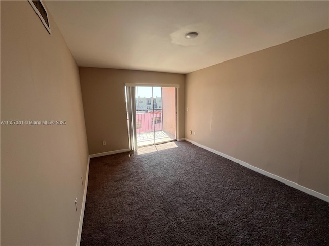 view of carpeted spare room