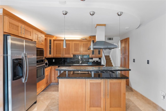 kitchen with hanging light fixtures, appliances with stainless steel finishes, sink, a kitchen island, and island range hood