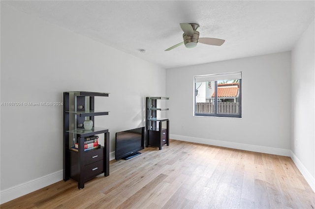 interior space with light hardwood / wood-style flooring and ceiling fan