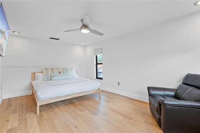 bedroom featuring ceiling fan and light hardwood / wood-style floors