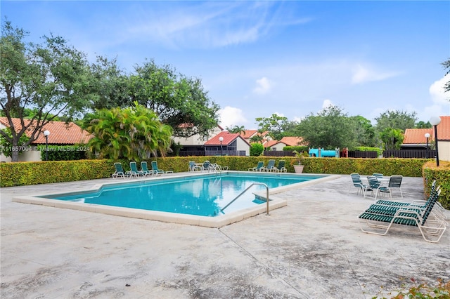 view of pool featuring a patio area