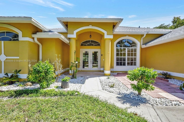 doorway to property featuring french doors