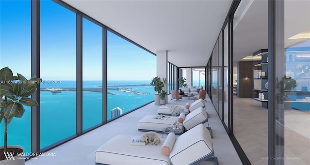 interior space featuring a water view and expansive windows