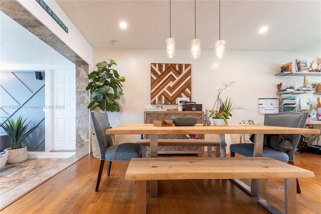 dining room with hardwood / wood-style flooring