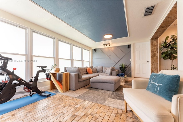 living room with a textured ceiling