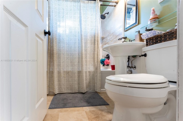 bathroom featuring a shower with curtain