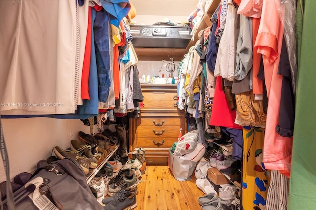 spacious closet featuring light wood-type flooring