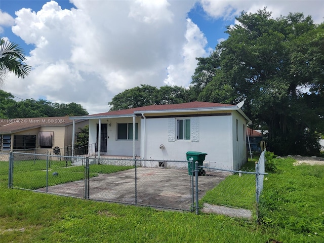 view of front of home with a front yard